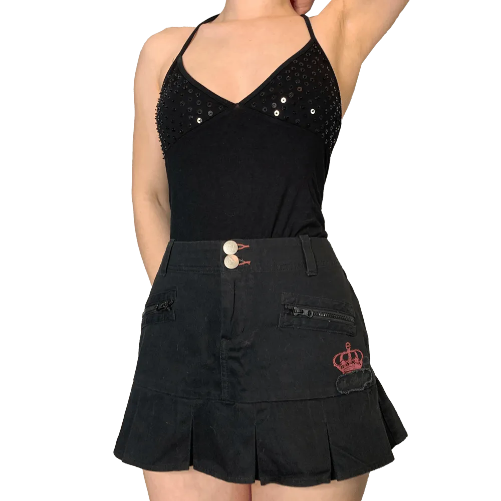 Black pleated mini skirt